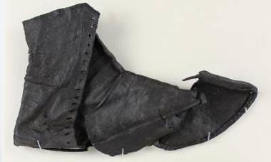 Medieval shoe fragment and sole made from leather