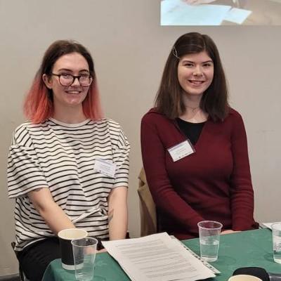 Two young people smiling