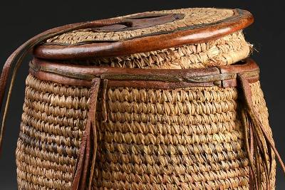 Woven basket with lid